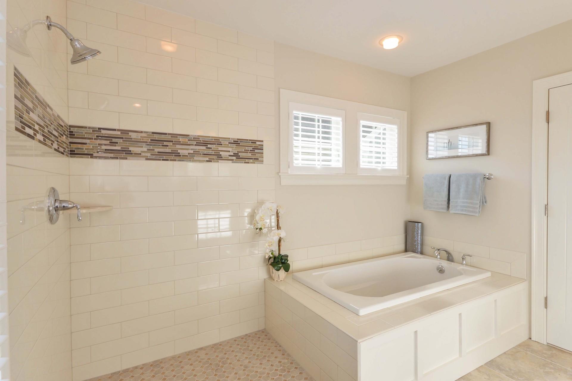8 Azalea Lane Mashpee, MA 02649 - Photo 13 of 30 a bathroom with a sink a vanity and a shower