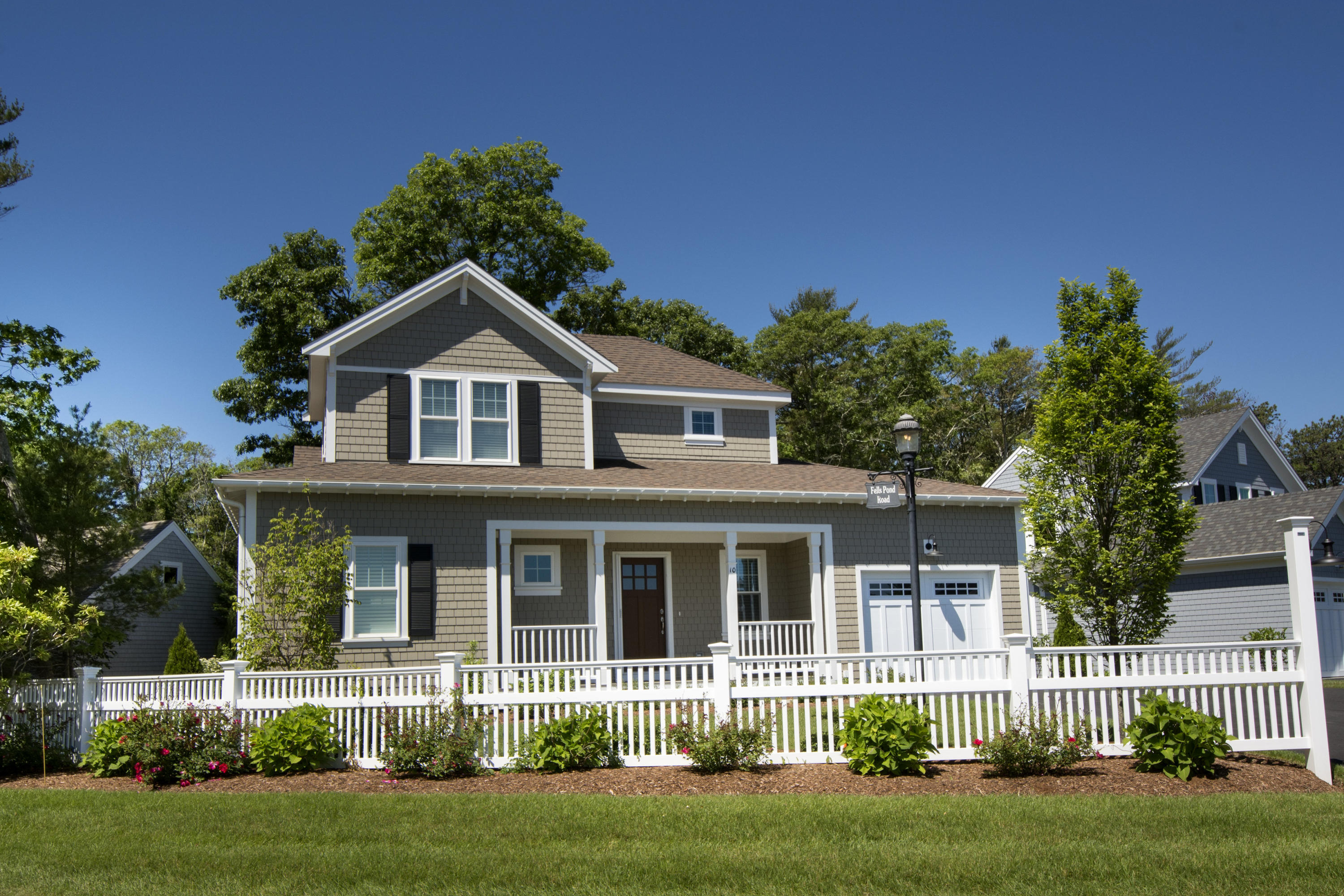 8 Azalea Lane Mashpee, MA 02649 - Photo 18 of 30 front view of a house with a yard