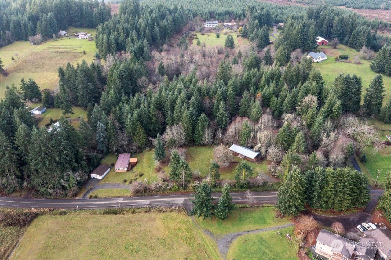 487 Tennessee Road Winlock, WA 98596 - Photo 31 of 33 a view of a swimming pool with a yard and plants