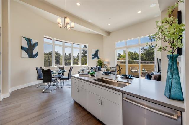 889 North San Antonio Road, Unit 2000 Los Altos, CA 94022 - Photo 3 of 14 a view of a living room and chandelier