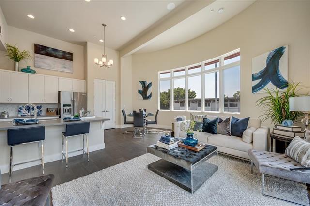 889 North San Antonio Road, Unit 2000 Los Altos, CA 94022 - Photo 5 of 14 a living room with furniture and a large window