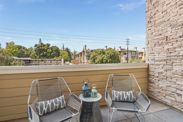 889 North San Antonio Road, Unit 2000 Los Altos, CA 94022 - Photo 10 of 14 a living room with furniture and a potted plant