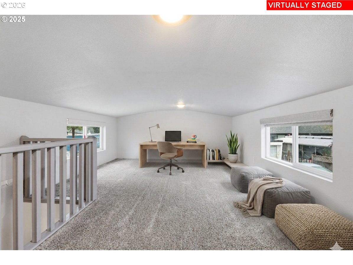 5990 Southeast King Road, Unit 18 Milwaukie, OR 97222 - Photo 21 of 24 a living room with furniture and windows