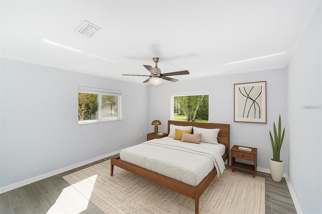 4805 Southwest 19th Street Gainesville, FL 32608 - Photo 26 of 43 a bedroom with a bed and a window