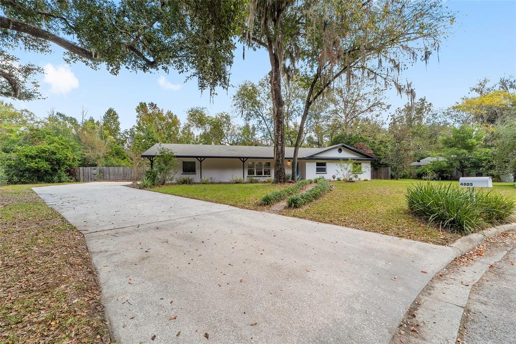 4805 Southwest 19th Street Gainesville, FL 32608 - Photo 7 of 43 a front view of house with yard and green space