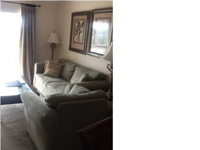 4270 Calinda Lane, Unit 357 Niceville, FL 32578 - Photo 6 of 17 a living room with furniture and a window