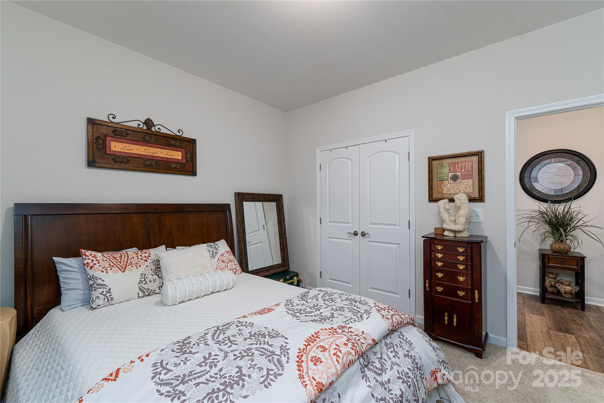 550 Rustlewood Way Rock Hill, SC 29732 - Photo 16 of 33 a bedroom with a bed and dresser