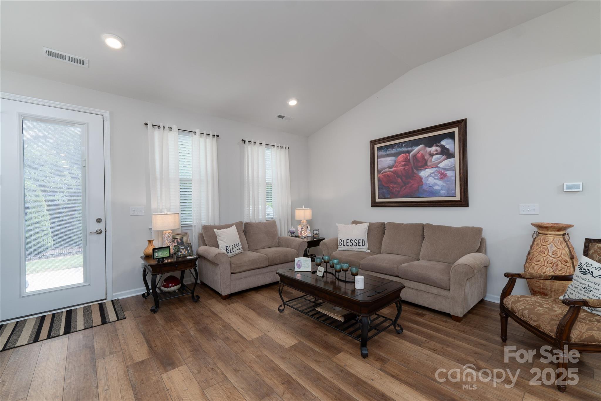 550 Rustlewood Way Rock Hill, SC 29732 - Photo 7 of 33 a living room with furniture and a hard wood floor