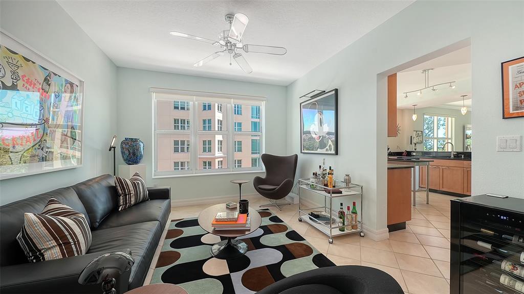 409 North Point Road, Unit 401 Osprey, FL 34229 - Photo 26 of 90 a living room with furniture or couch and a window