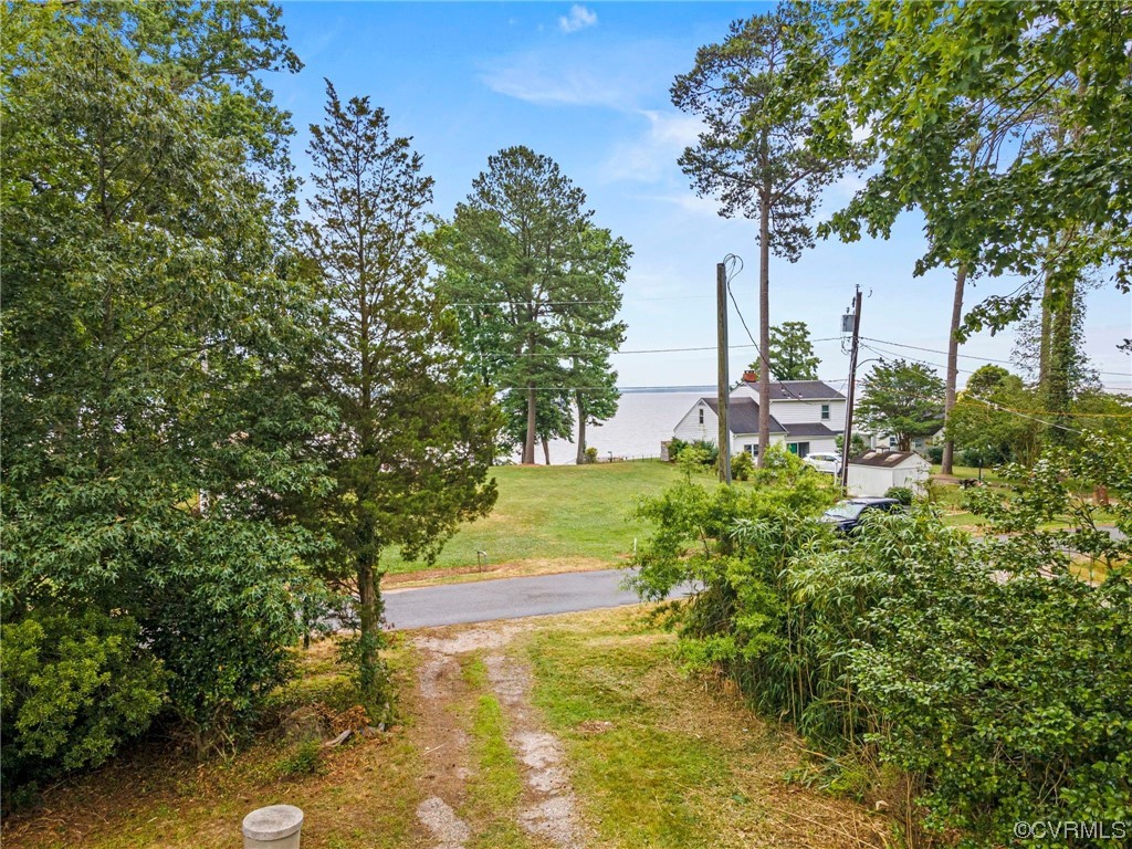 10141 Sycamore Landing Road Williamsburg, VA 23188 - Photo 1 of 15 a view of a yard