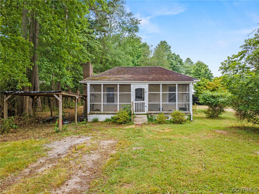 10141 Sycamore Landing Road Williamsburg, VA 23188 - Photo 15 of 15 a house with trees in the background