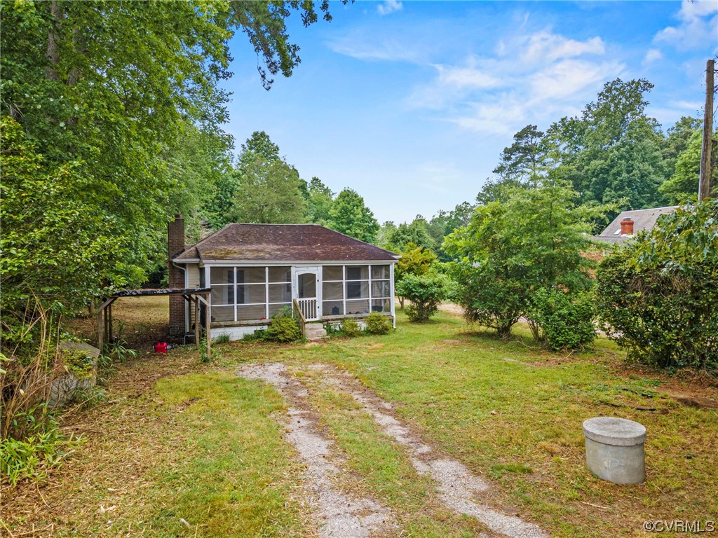 10141 Sycamore Landing Road Williamsburg, VA 23188 - Photo 2 of 15 a view of a house with a yard