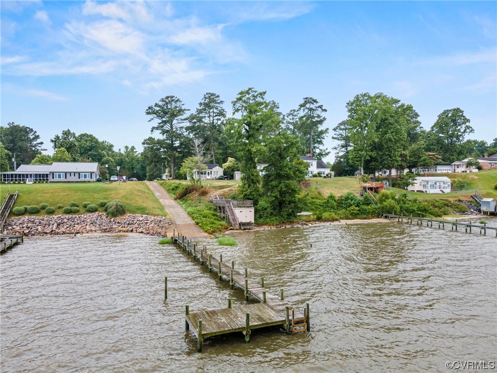 10141 Sycamore Landing Road Williamsburg, VA 23188 - Photo 10 of 15 a view of a lake with houses