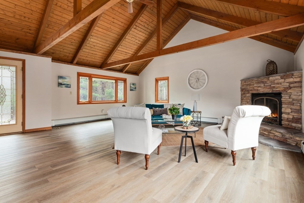 4 Darrell Drive North Reading, MA 01864 - Photo 13 of 41 a living room with fireplace furniture and a wooden floor