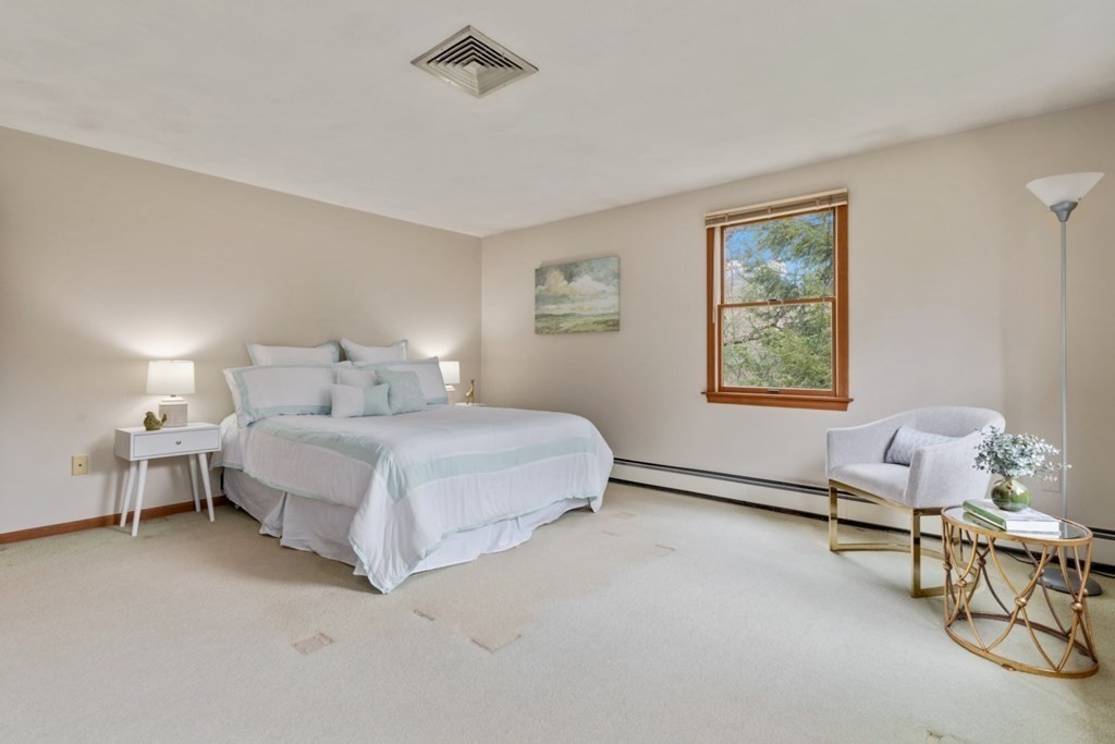 4 Darrell Drive North Reading, MA 01864 - Photo 24 of 41 a bedroom with a bed and a window