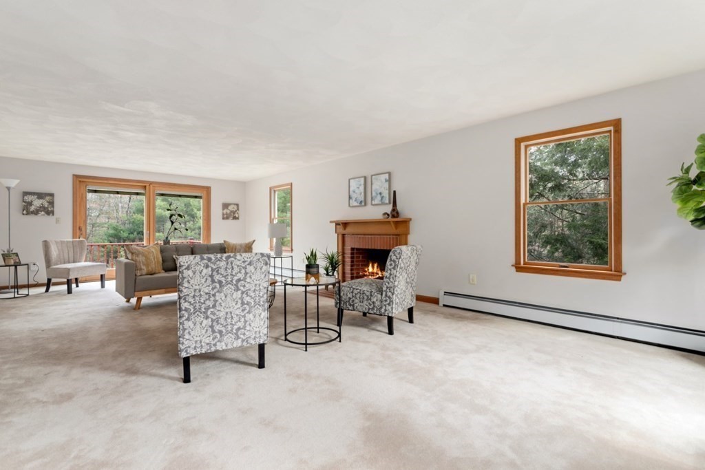 4 Darrell Drive North Reading, MA 01864 - Photo 6 of 41 a living room with furniture and a fireplace