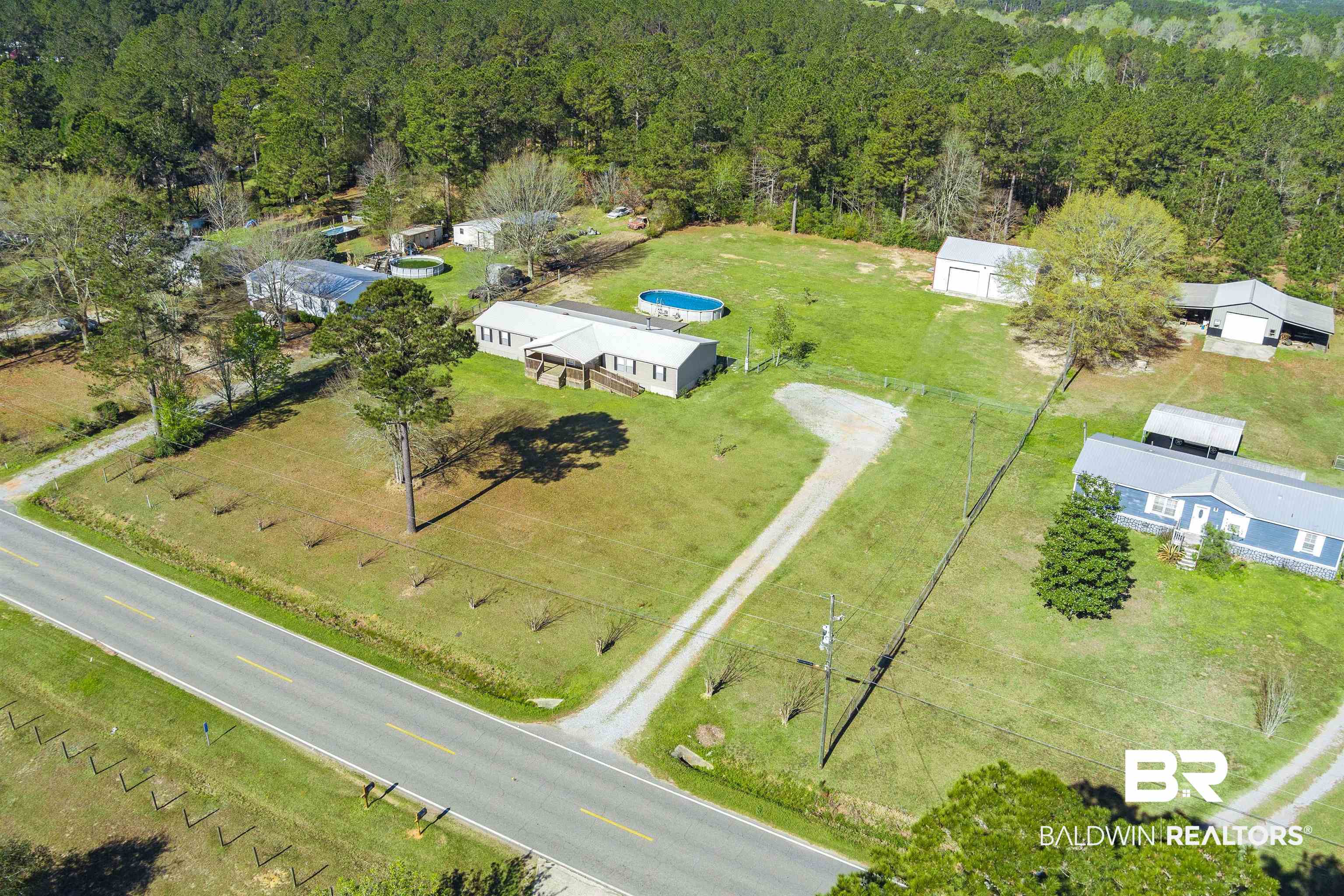 9011 Wilmer Georgetown Road Wilmer, AL 36587 - Photo 33 of 34 Bird's eye view with a view of trees