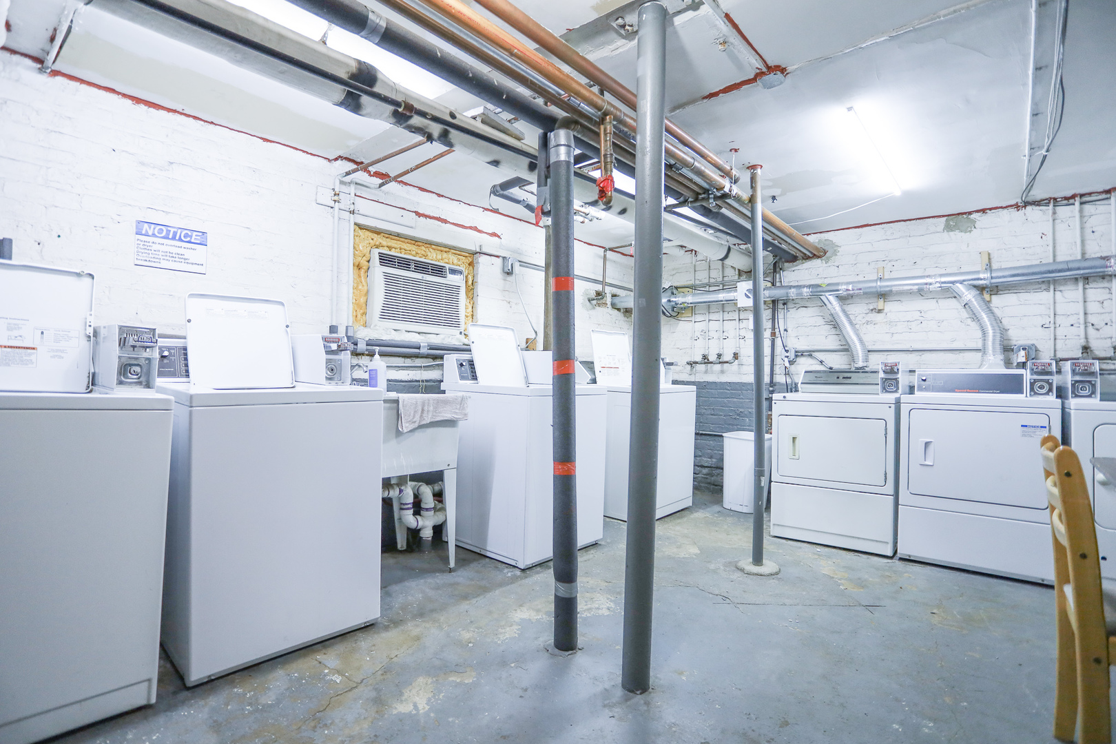 2712 North Milwaukee Avenue, Unit 314 Chicago, IL 60647 - Photo 7 of 7 a room with storage and utility