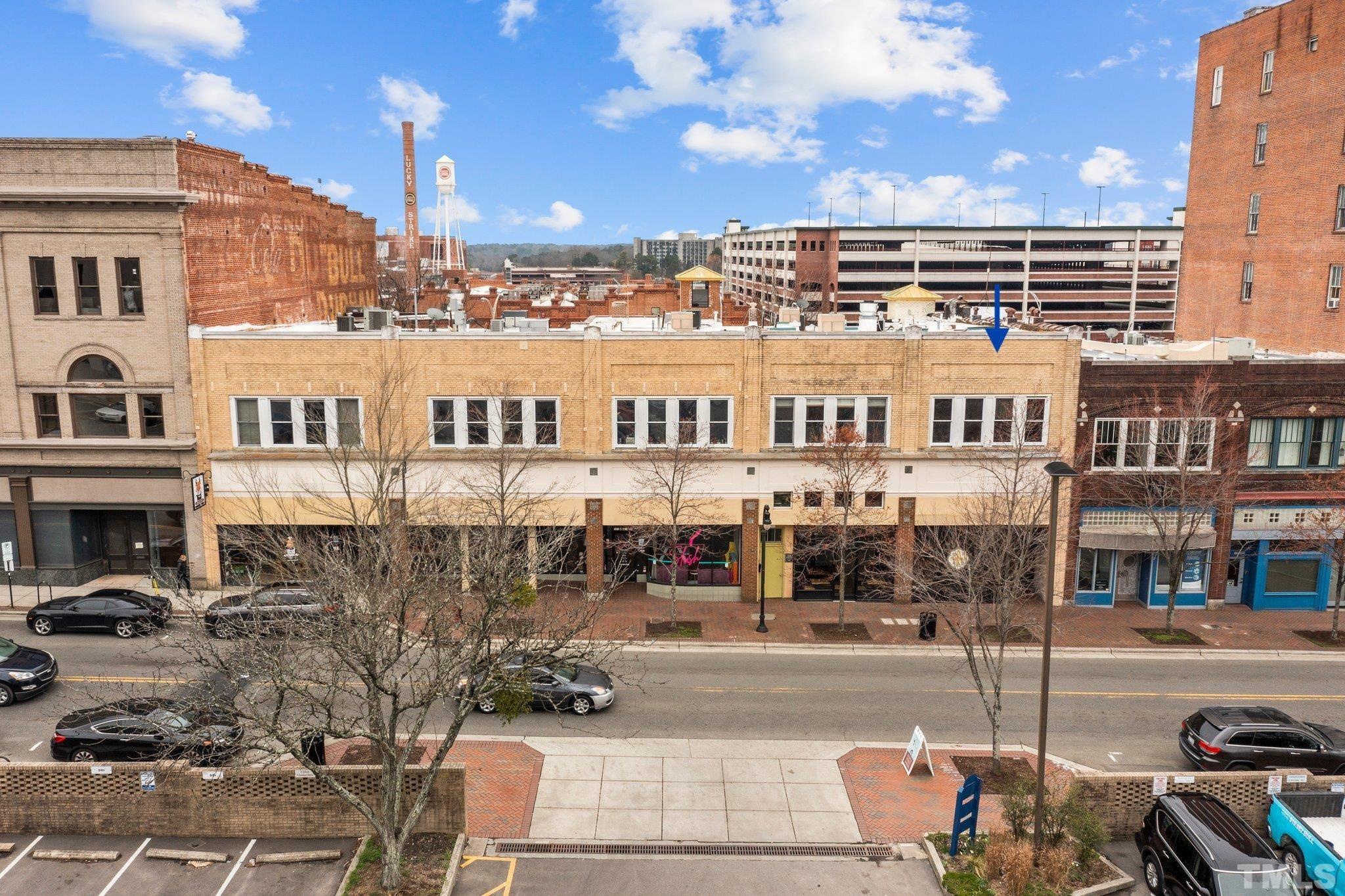 323 West Main Street, Unit J Durham, NC 27701 - Photo 2 of 36 a view of a city with tall buildings