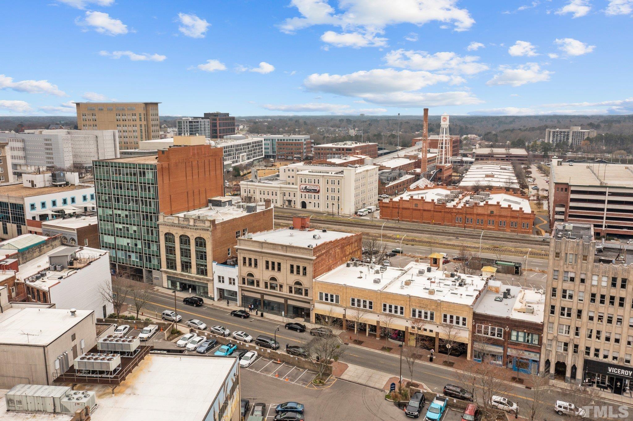 323 West Main Street, Unit J Durham, NC 27701 - Photo 36 of 36 a city view with tall buildings