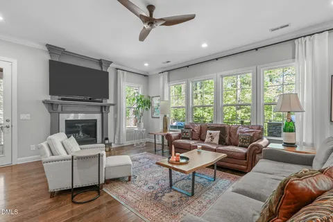 a dining room with furniture window wooden floor