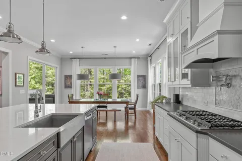 a bed room with a bed and a large window