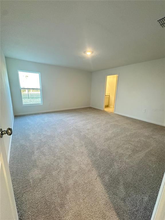2117 Lasso Loop Eagle Lake, FL 33839 - Photo 35 of 41 an empty room with a window