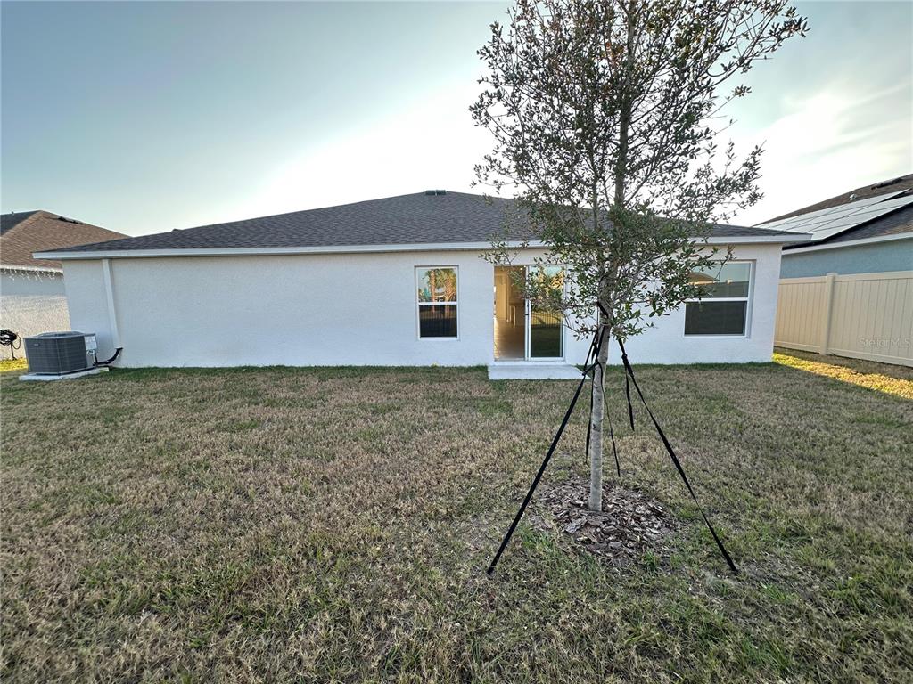 2117 Lasso Loop Eagle Lake, FL 33839 - Photo 38 of 41 a house view with a backyard space