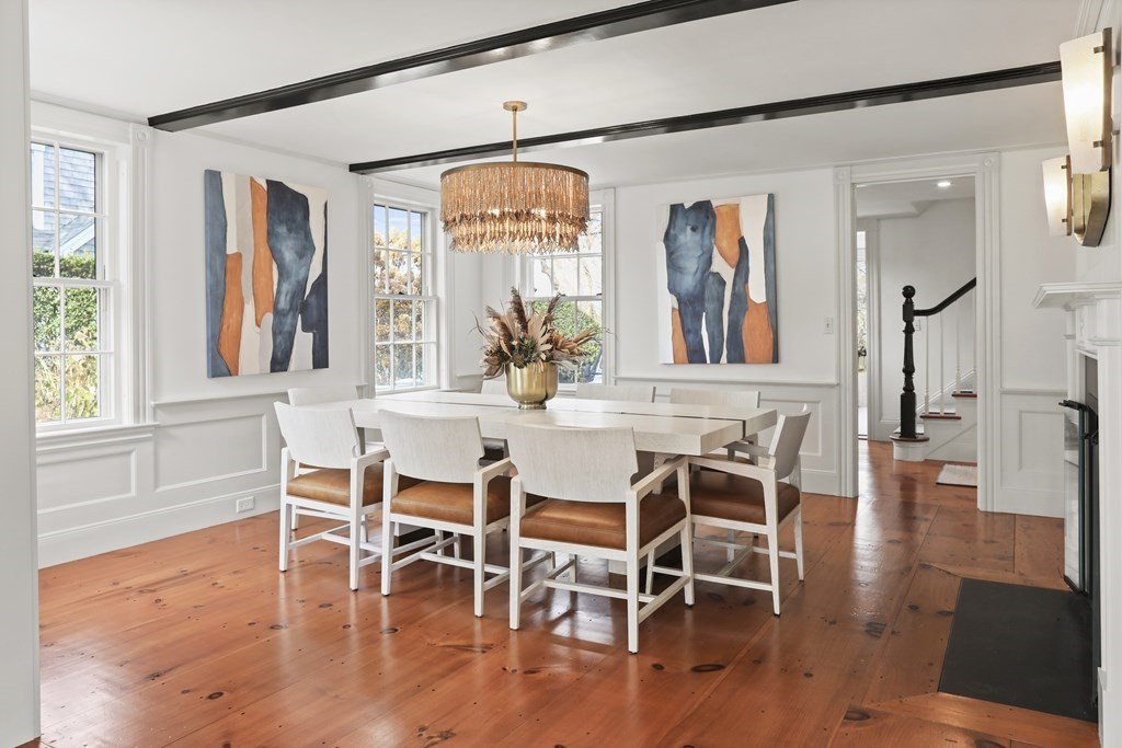 134 Main Street Nantucket, MA 02554 - Photo 13 of 42 a view of a dining room with furniture window and wooden floor