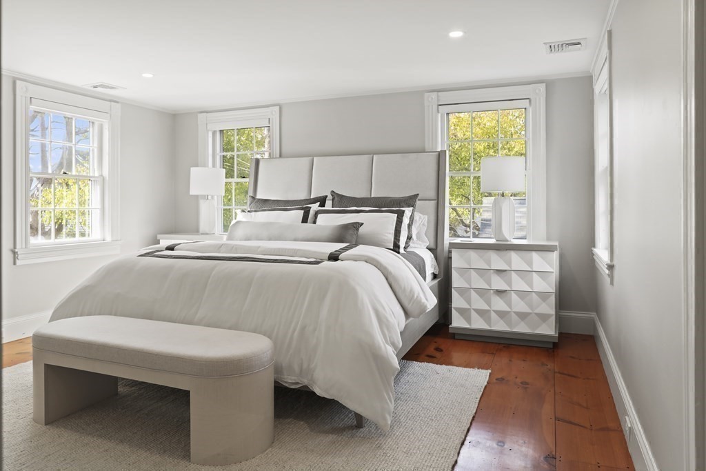 134 Main Street Nantucket, MA 02554 - Photo 21 of 42 a bed room with a bed and a window