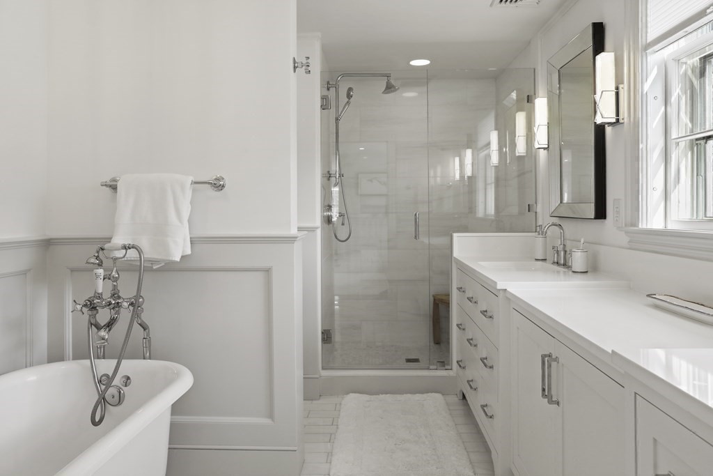 134 Main Street Nantucket, MA 02554 - Photo 22 of 42 a bathroom with a bathtub shower sink vanity and toilet