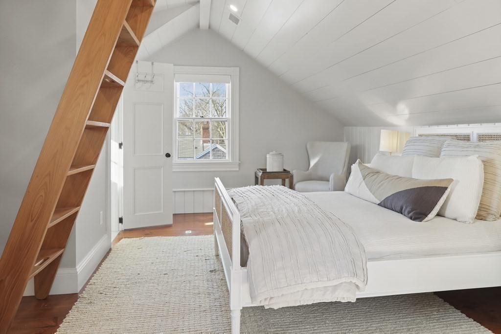 134 Main Street Nantucket, MA 02554 - Photo 25 of 42 a bedroom with a bed and a window