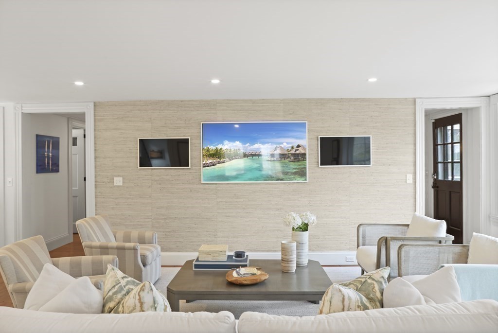 134 Main Street Nantucket, MA 02554 - Photo 7 of 42 a living room with furniture and a flat screen tv