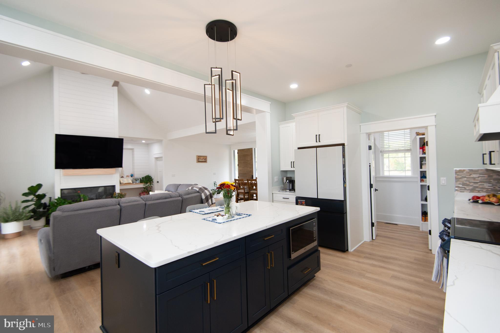 9509 Rum Ridge Road Delmar, MD 21875 - Photo 15 of 76 a kitchen with a sink appliances and wooden floor