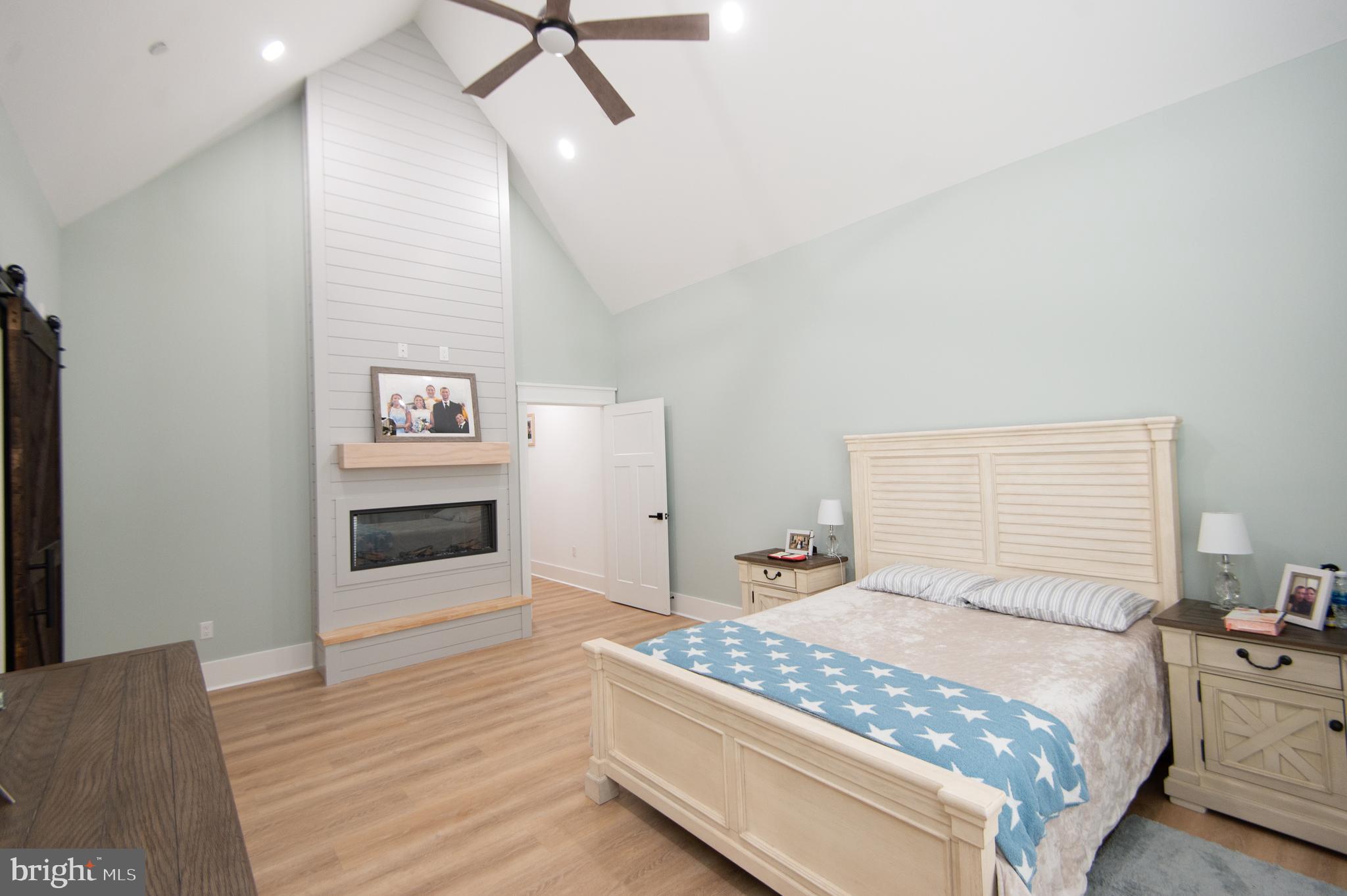 9509 Rum Ridge Road Delmar, MD 21875 - Photo 21 of 76 a bedroom with a bed and a dresser