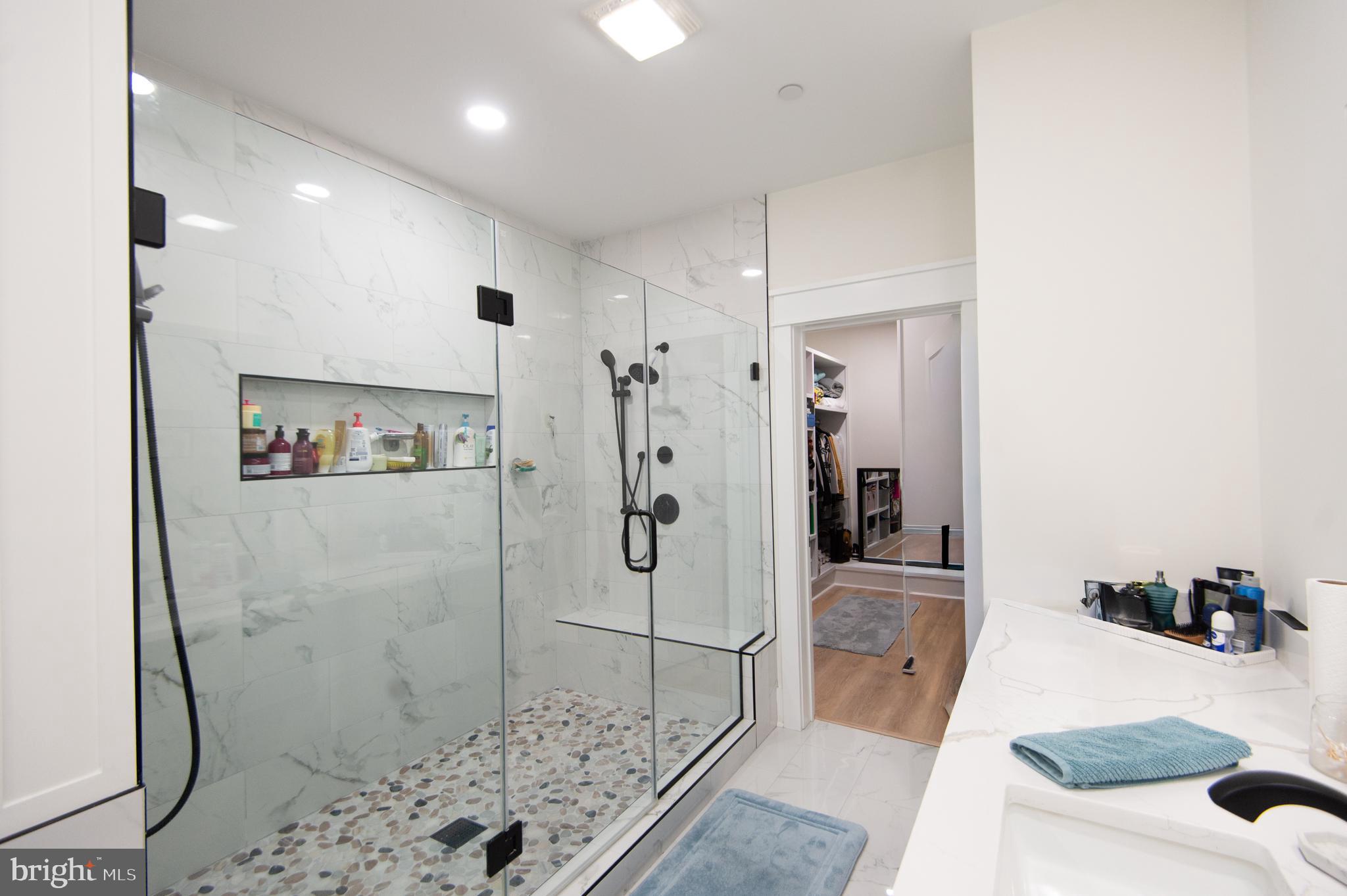 9509 Rum Ridge Road Delmar, MD 21875 - Photo 25 of 76 a bathroom with a sink and a shower