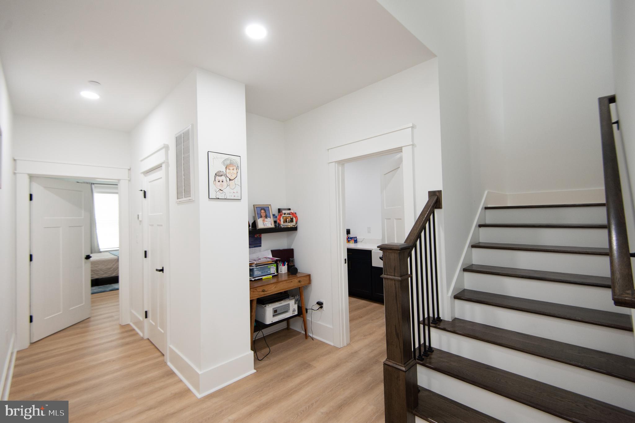 9509 Rum Ridge Road Delmar, MD 21875 - Photo 42 of 76 a view of a hallway with wooden floor and entryway