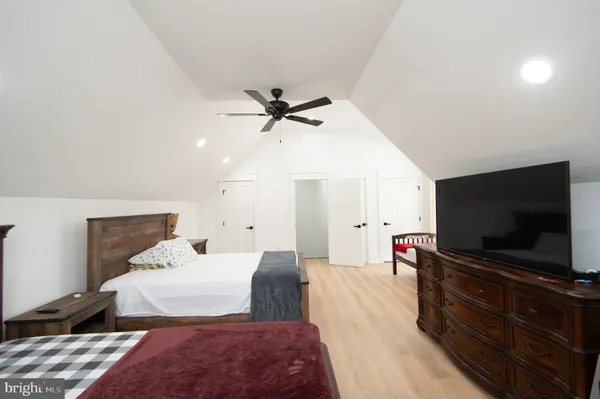 an aerial view of a house with a garden