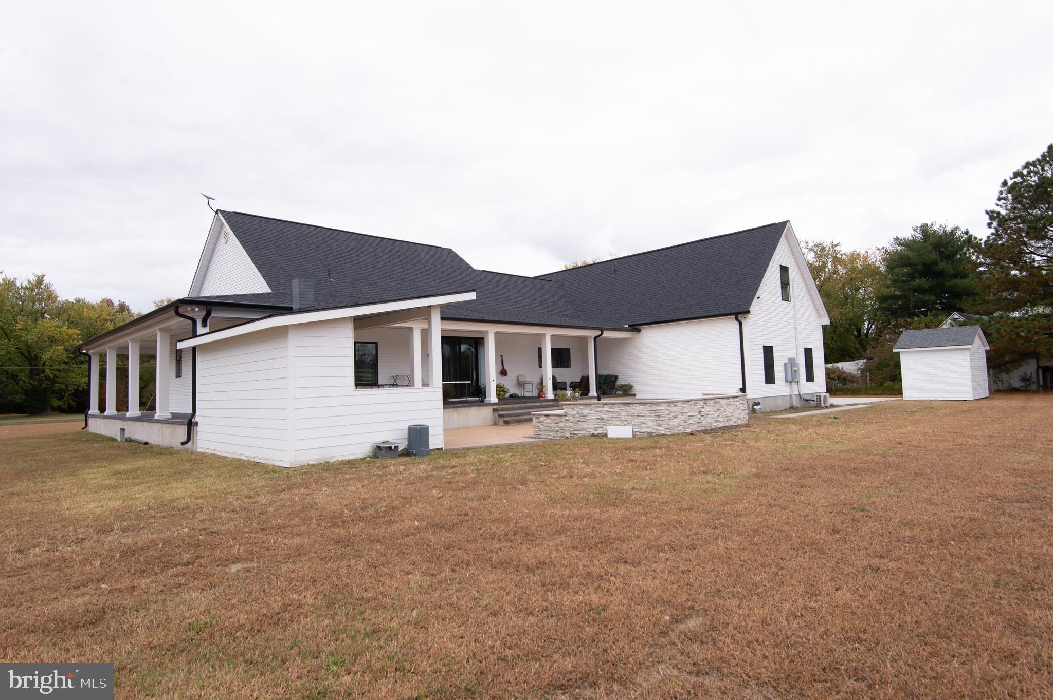 9509 Rum Ridge Road Delmar, MD 21875 - Photo 61 of 76 a front view of a house with a yard