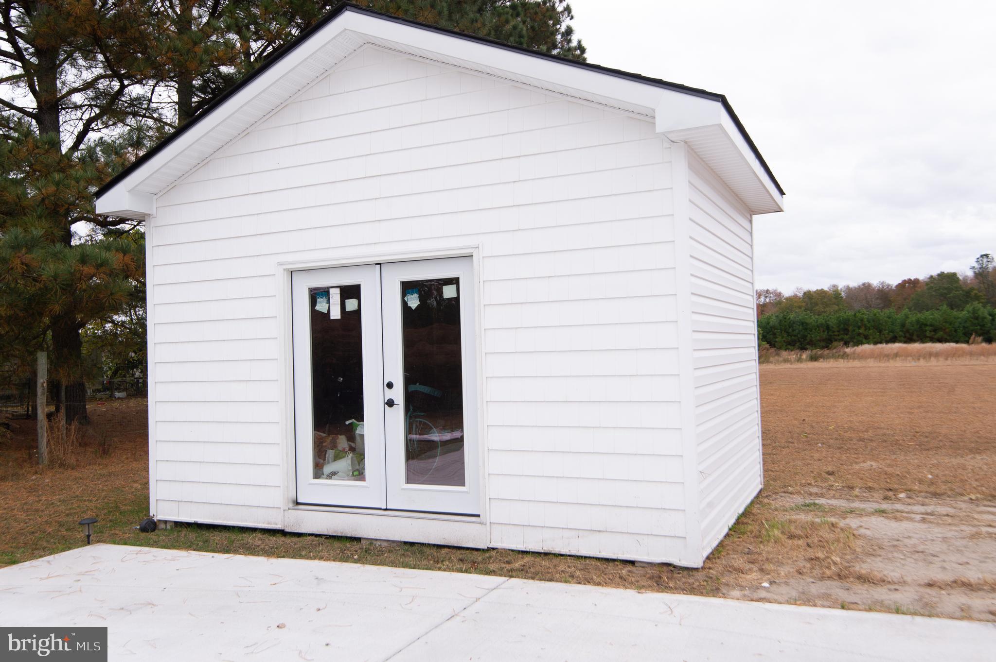 9509 Rum Ridge Road Delmar, MD 21875 - Photo 65 of 76 a view of a house with a yard