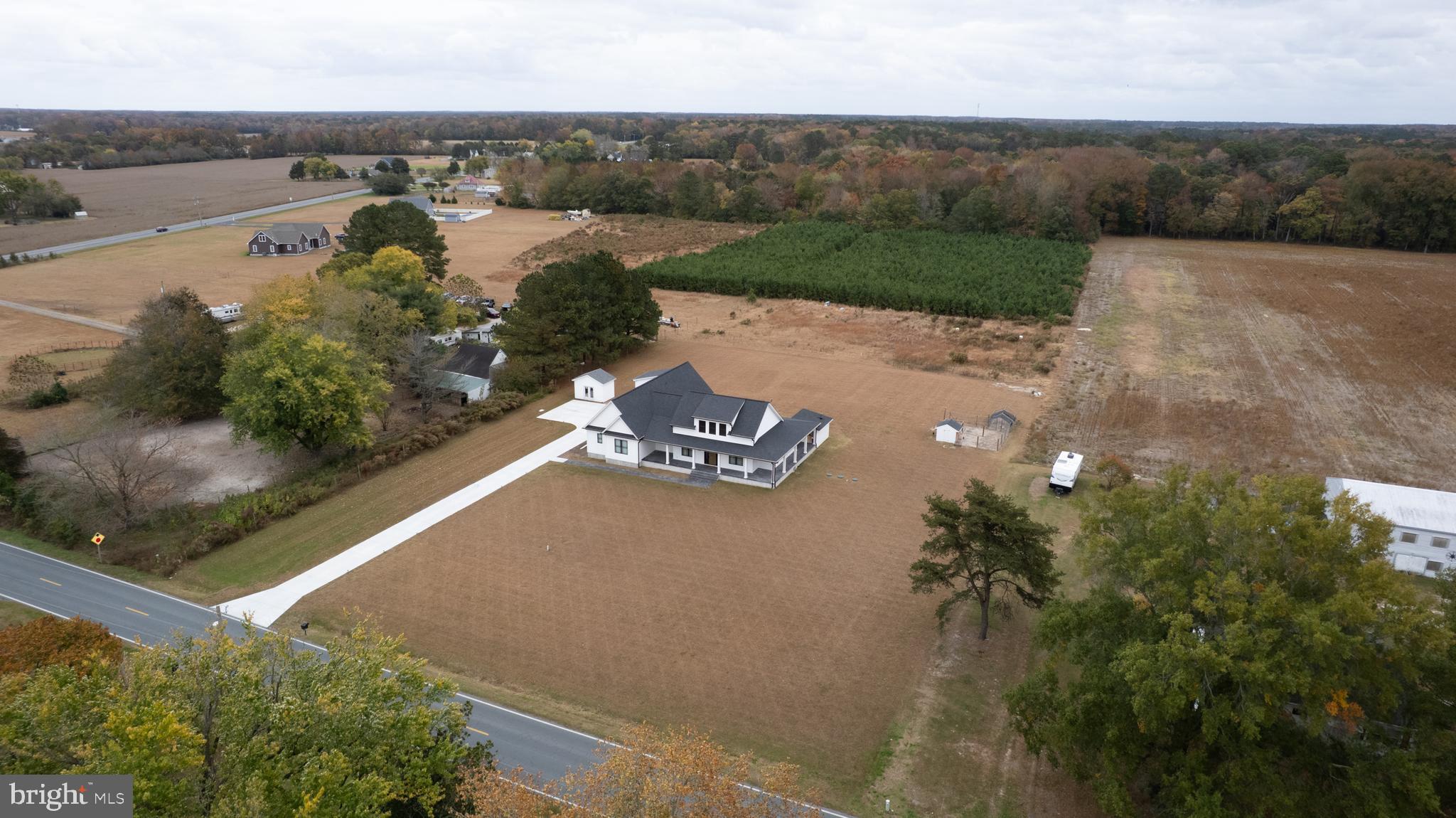 9509 Rum Ridge Road Delmar, MD 21875 - Photo 70 of 76 an aerial view of a house with a garden
