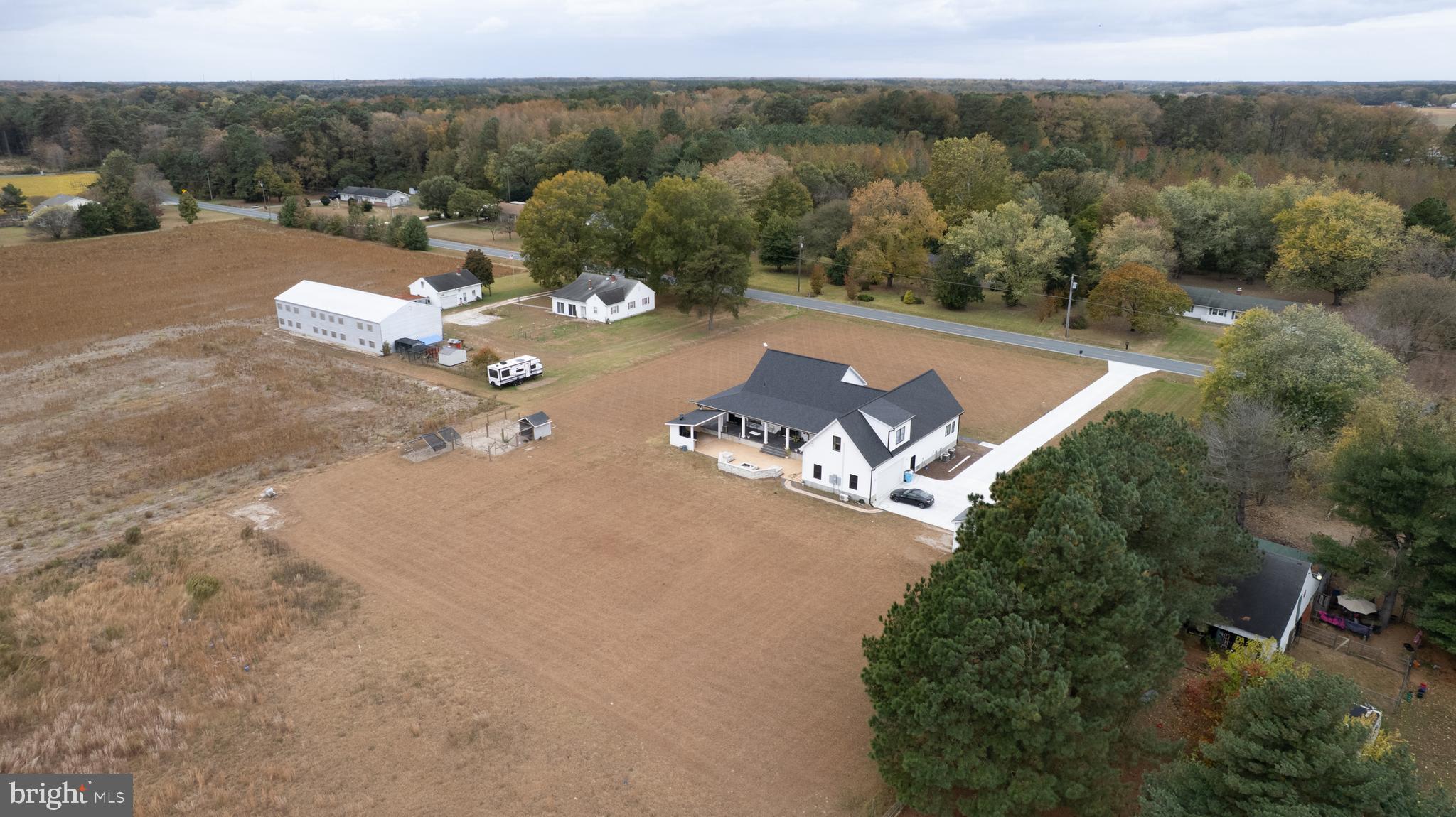 9509 Rum Ridge Road Delmar, MD 21875 - Photo 74 of 76 an aerial view of a house with a yard