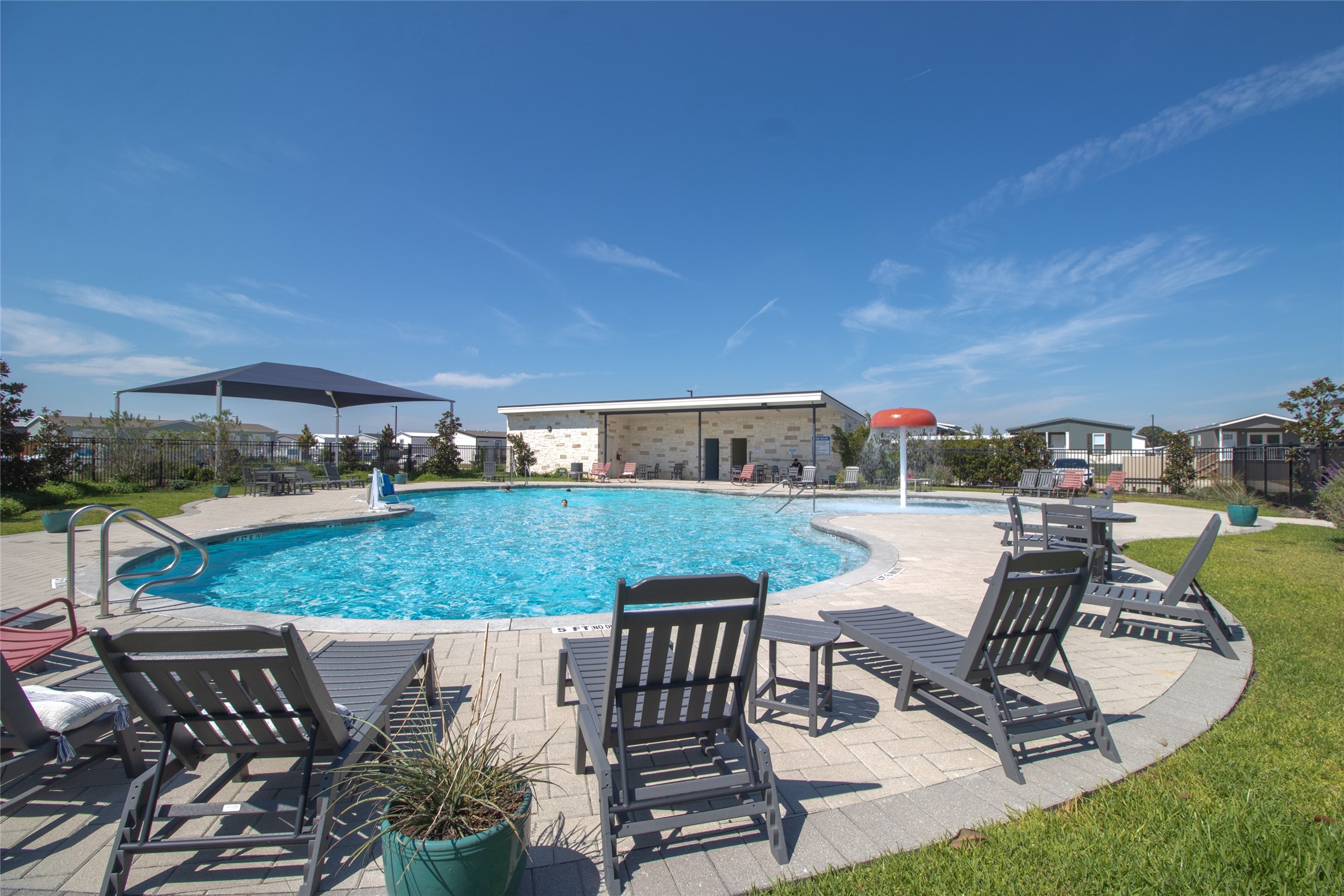 119 Mooney Road Pearland, TX 77581 - Photo 23 of 25 a view of a swimming pool and patio