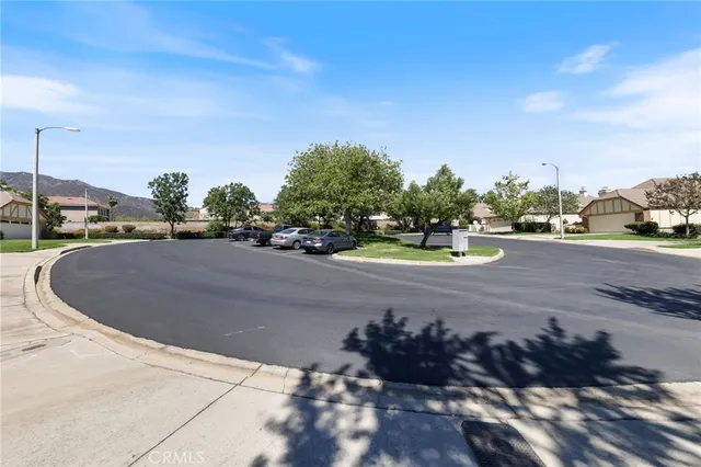a view of house with a yard