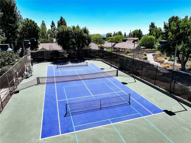 an aerial view of a house with outdoor space
