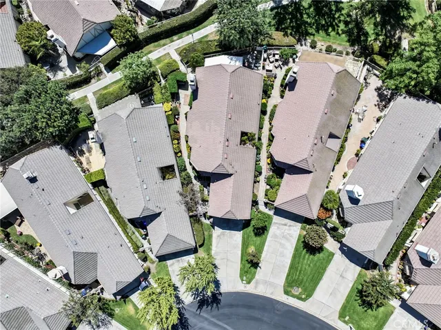 a view of a chairs and table in the patio