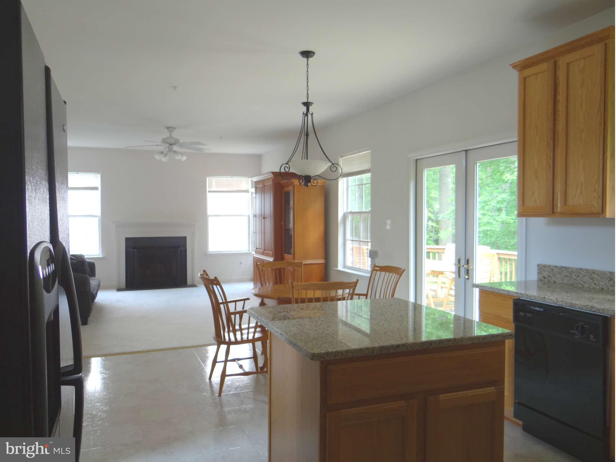 8809 Sumner Grove Drive Laurel, MD 20708 - Photo 10 of 30 Kitchen & Family Room view