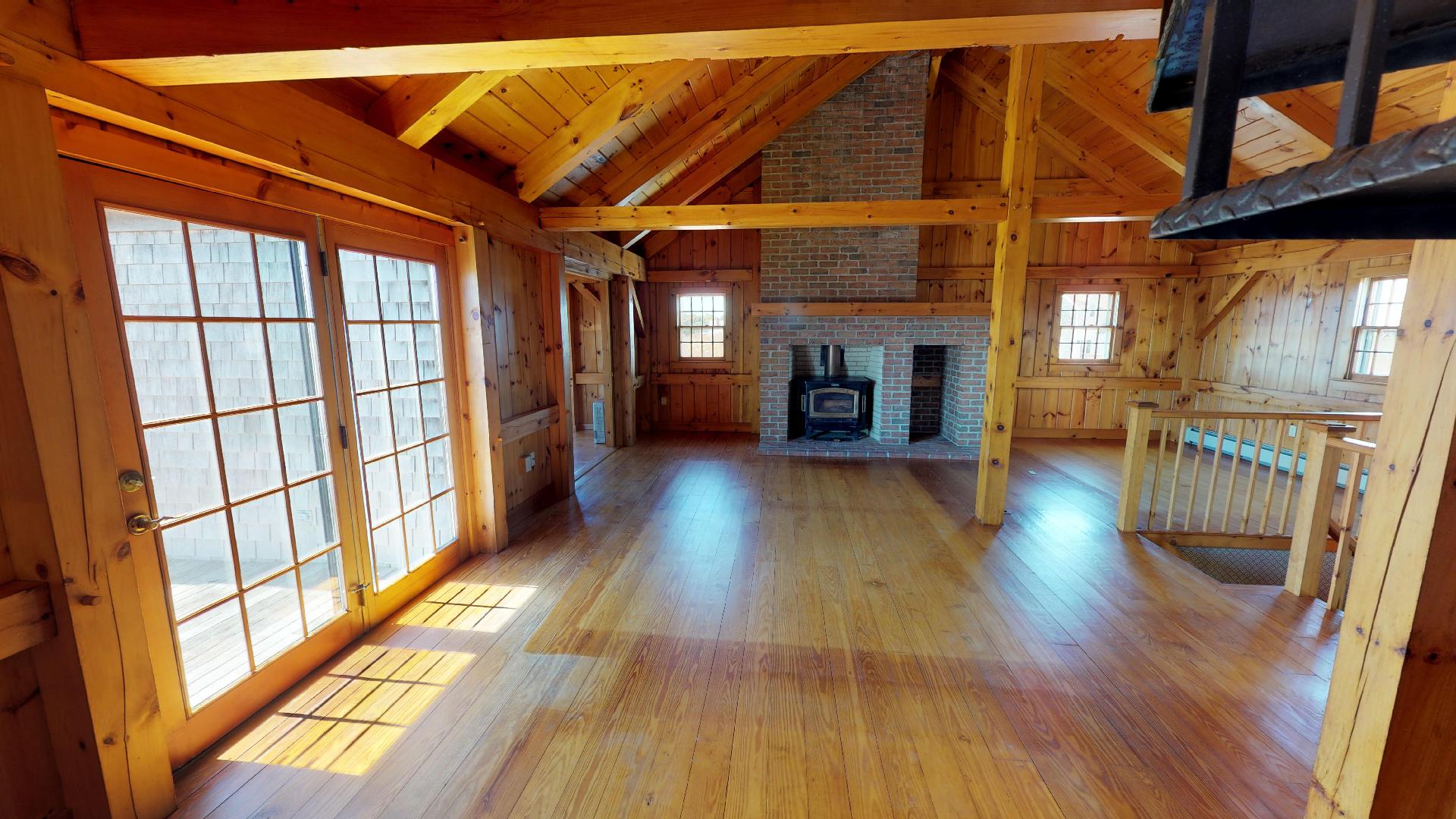 234 Madaket Road Nantucket, MA 02554 - Photo 20 of 50 large living room with cathedral ceiling and French door to deck.