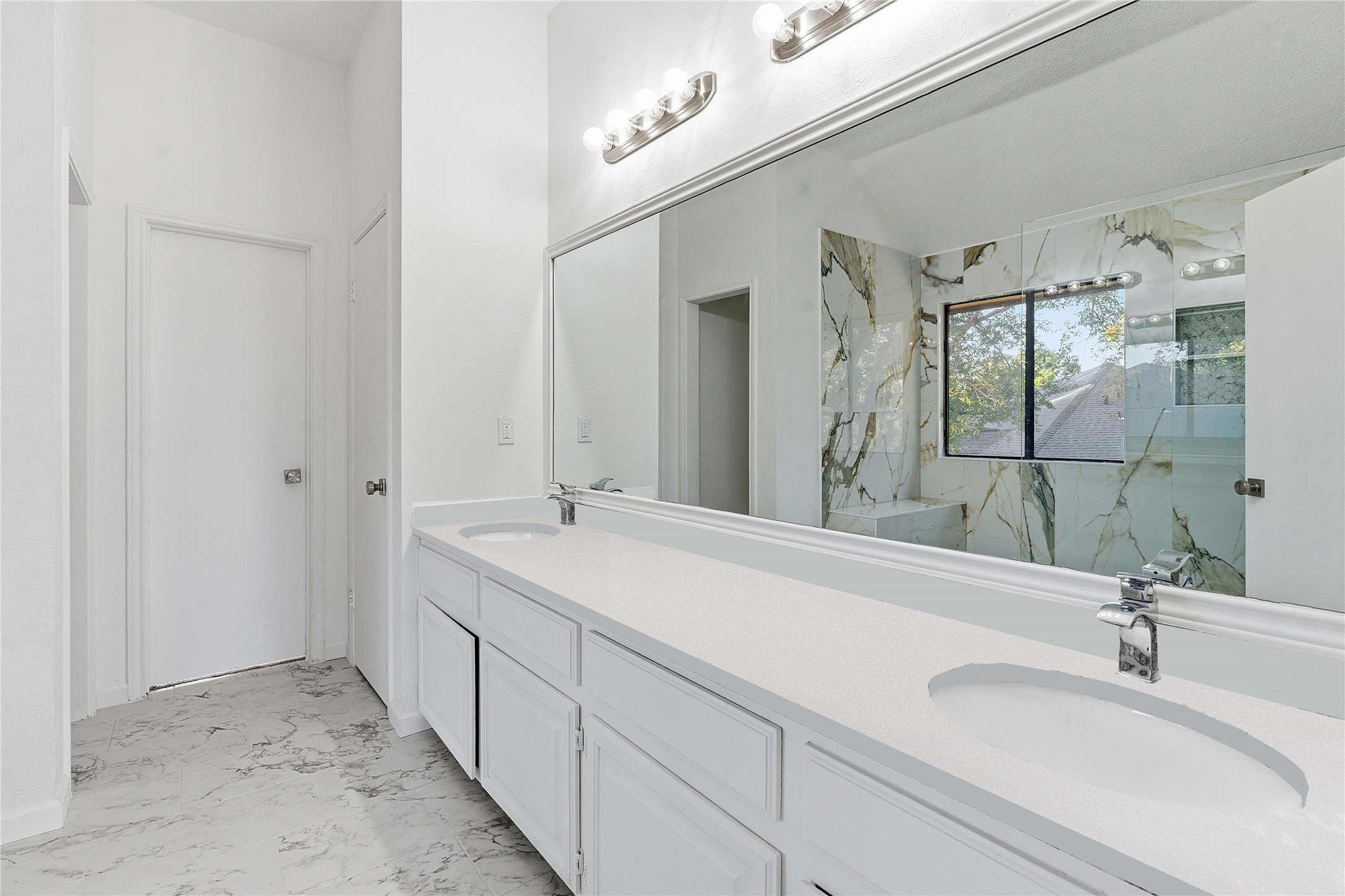 1106 Split Oak Cove Pflugerville, TX 78660 - Photo 14 of 25 a bathroom with a double vanity sink mirror and double