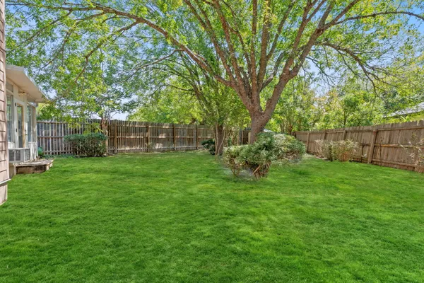 a view of a backyard with a garden